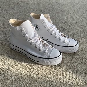 White Converse high-top platform sneakers